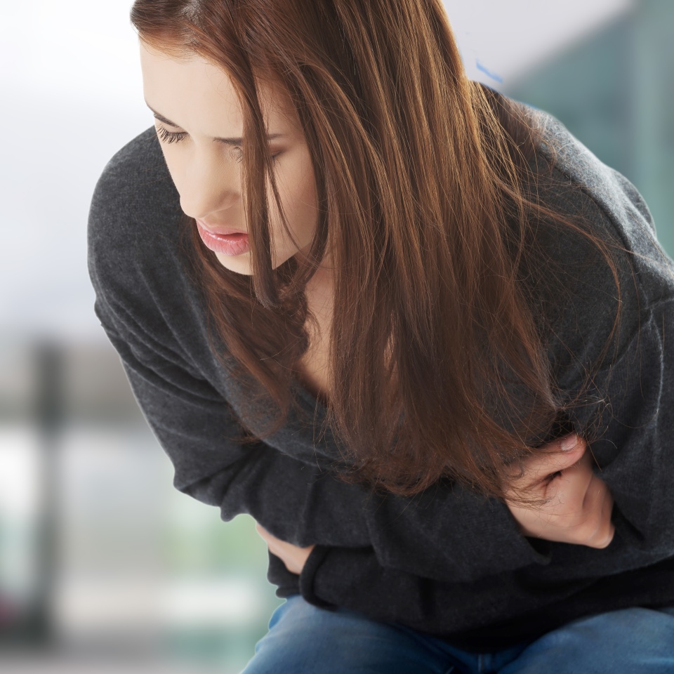 Young woman with stomach issues
